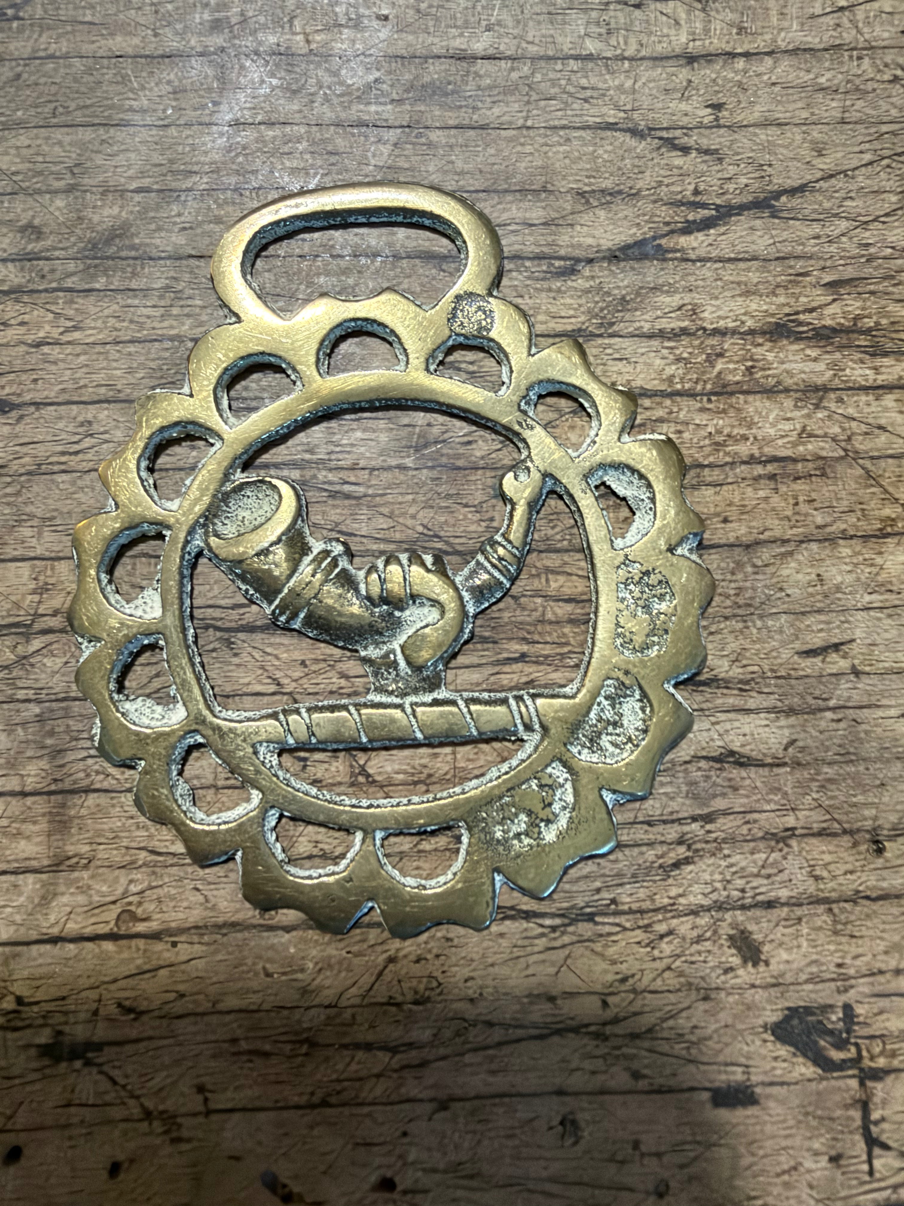 Scalloped Horse Brass Medallion with Horn Motif and Rich Patina